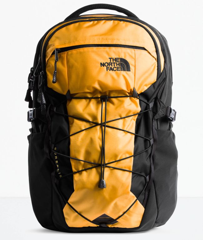 orange and black north face backpack